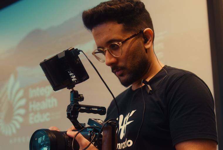 Cinegrafista da HR em cobertura de congresso